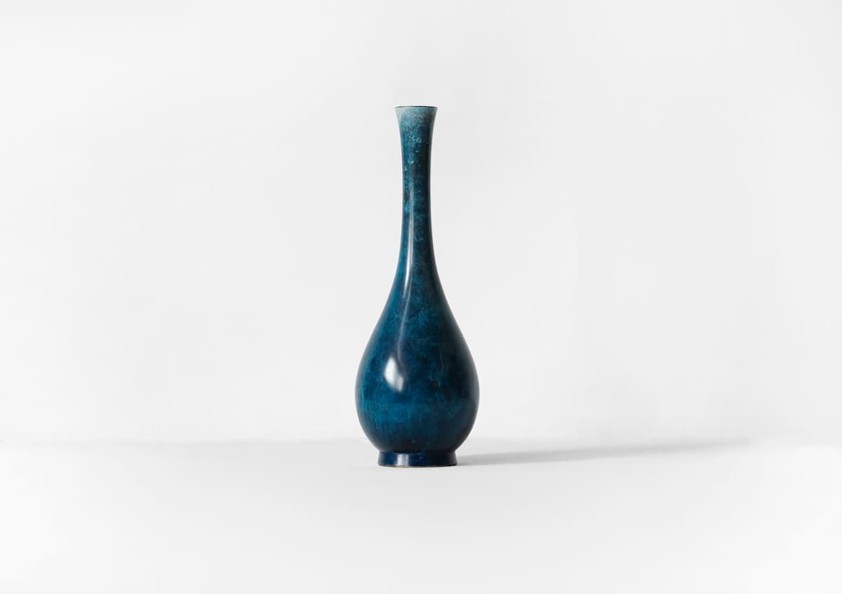 A blue ceramic vase for sale