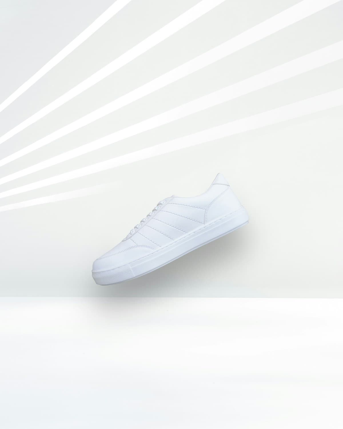 A white low-top sneaker for sale